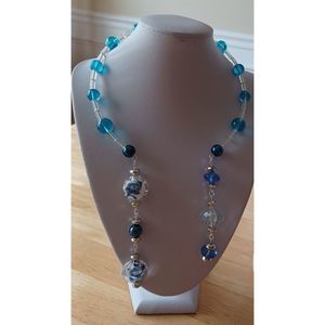 NWOT chocker necklace shades of blue/clear beads and earrings with silver accent